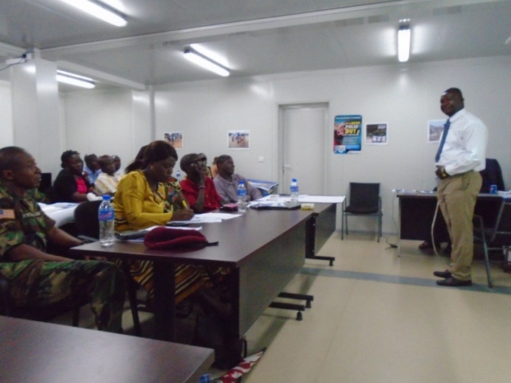 Hon Tolbert Nyenswah Deputy Minister of Health Disease Surveillance and Epidemic Control addressing participants
