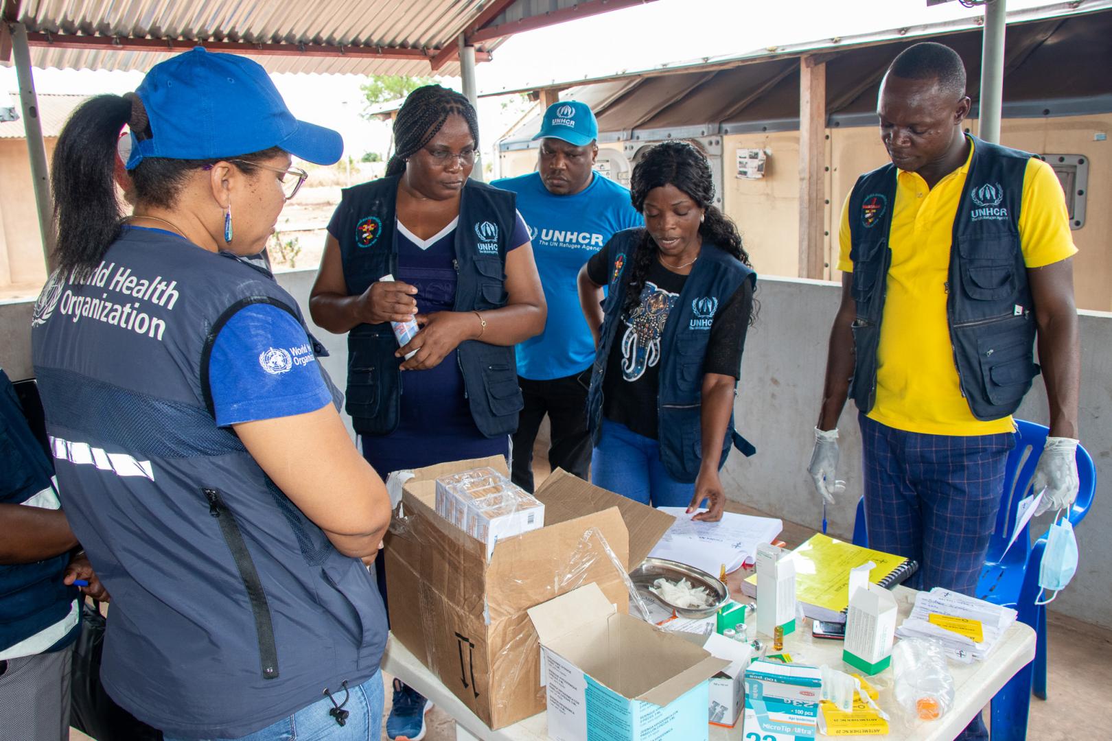 WHO, UNHCR and IEIA assessing the health clinic in Lovua Refugee Settlement