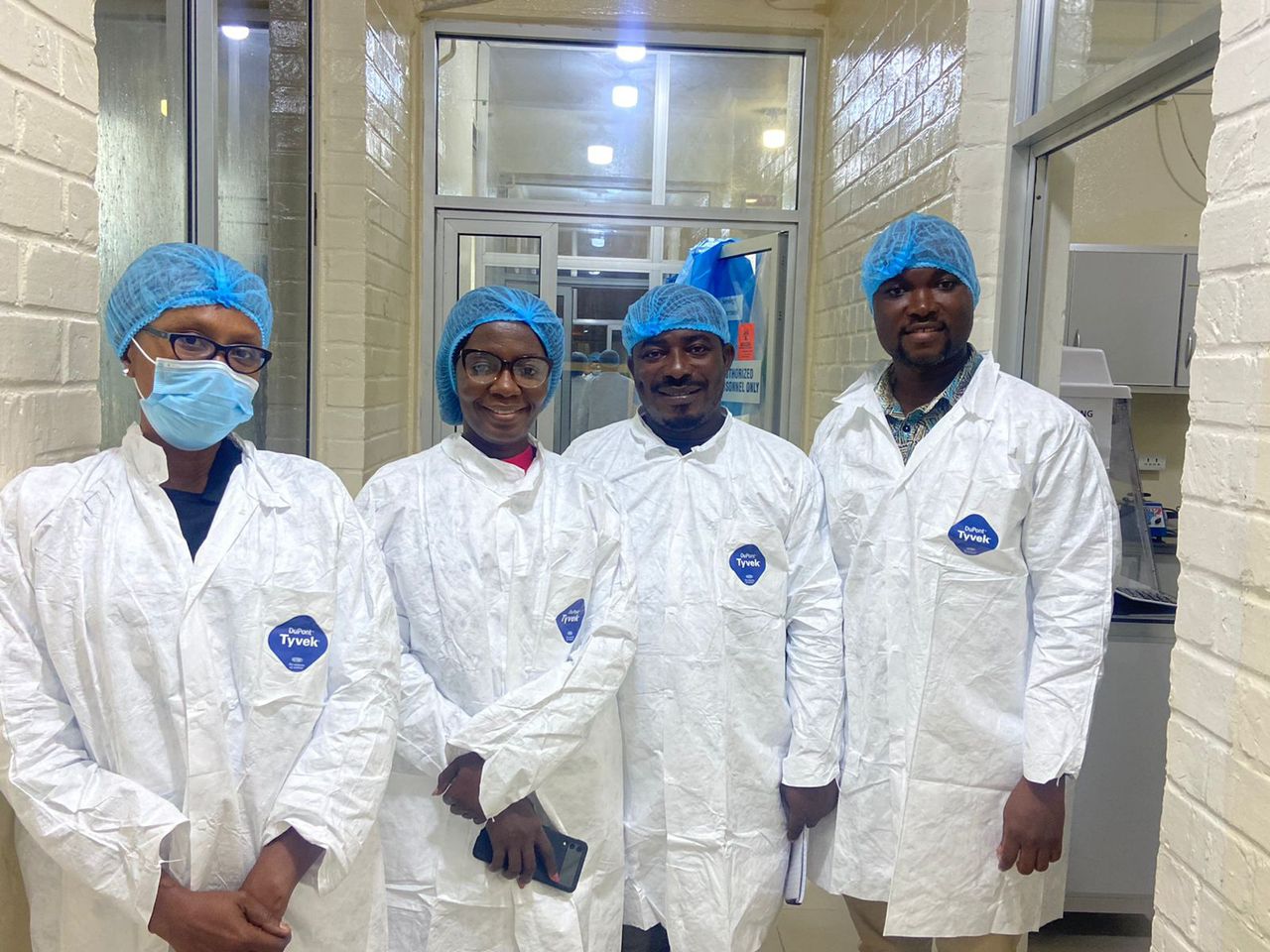 National laboratory technicians with WHO staff during the training