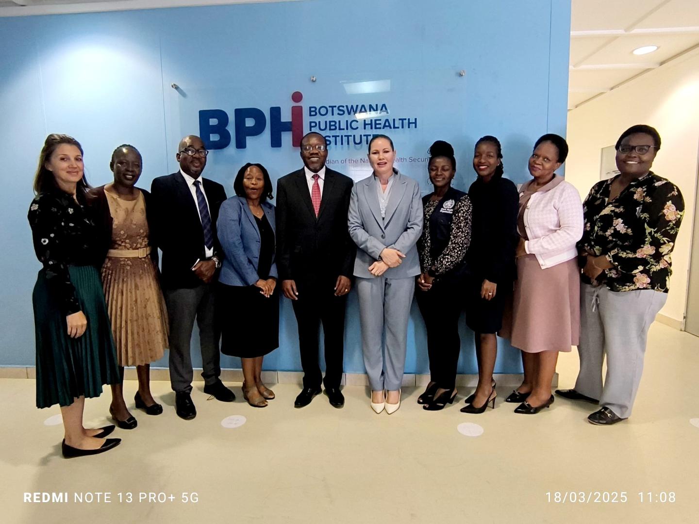 Dr Fabian Ndenzako and his team meeting the Botswana Public Health Institute team, led by Dr Pamela Smith-Lawrence