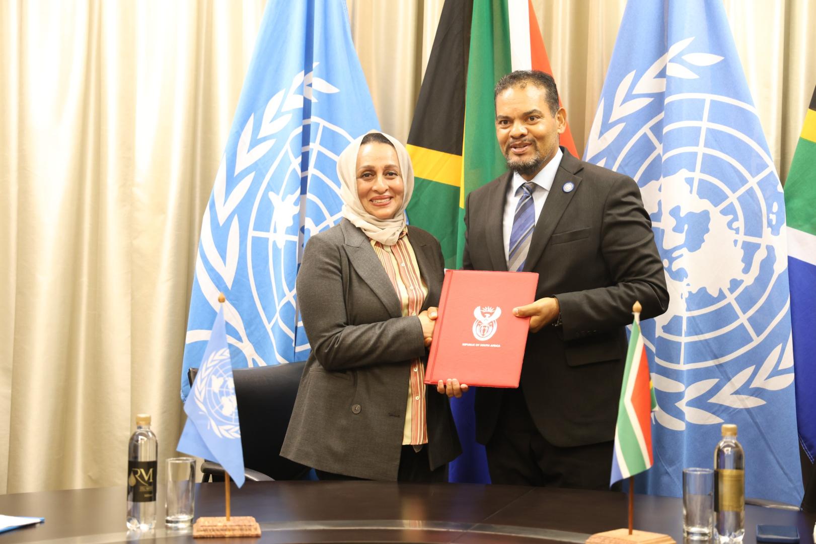 Ms. Sheenaz El-Halabi, WHO Representative to South Africa (left) presenting her credentials to Deputy Minister Alvin Botes of Department of International Relations and Cooperation (DIRCO).