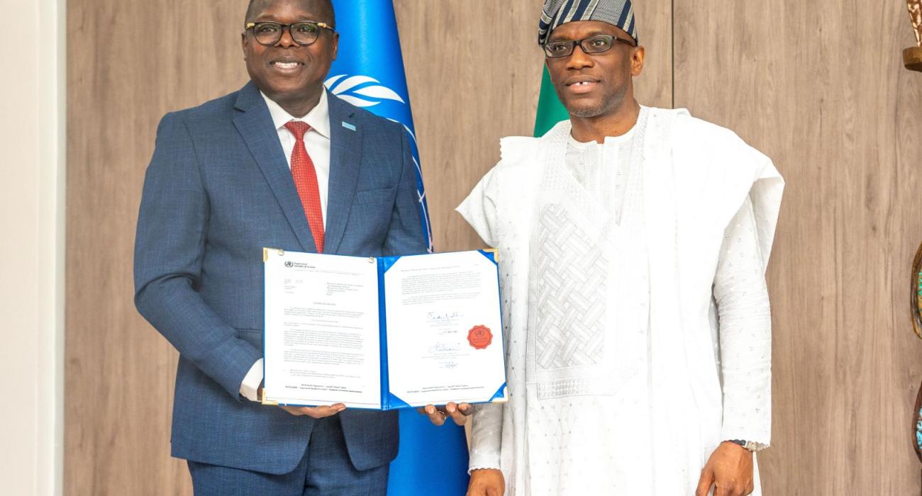 Dr. Kouamé Jean KONAN, WHO Representative, officially presenting his credentials to His Excellency Mr. Olushegun Adjadi BAKARI, Minister of Foreign Affairs of the Republic of Benin