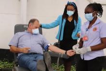 The UN Resident Coordinator, Mr. Zlatan Milisic giving the gift of blood. Dr. Tigest Ketsela, WHO Representative witnessing the gesture during the WBDD 2021 commemorations