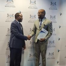 Dr Fabian Ndenzako with Minister of Health, Dr Stephen Modise