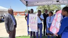 Presentation of TB awareness posters to WHO