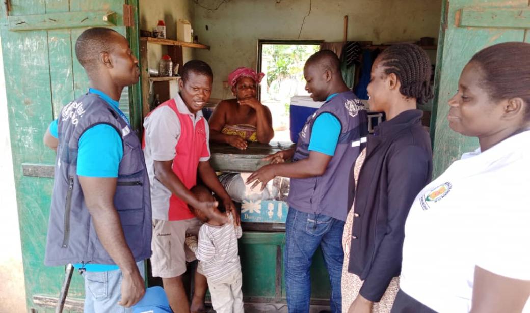 The team convincing the family on vaccine uptake